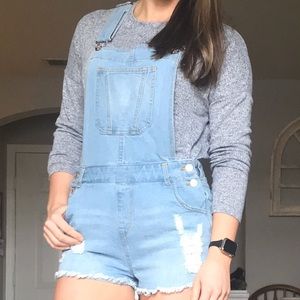 Light wash distressed overalls